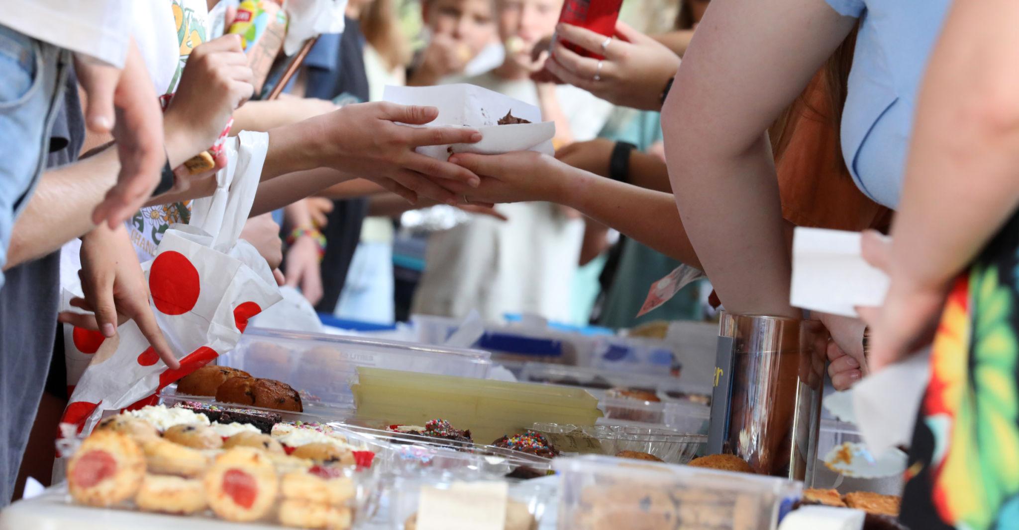 Community bake sale fundraiser for education programs