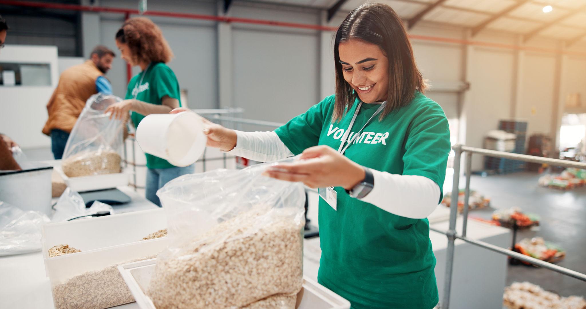 Volunteers packing food for hunger relief organizations