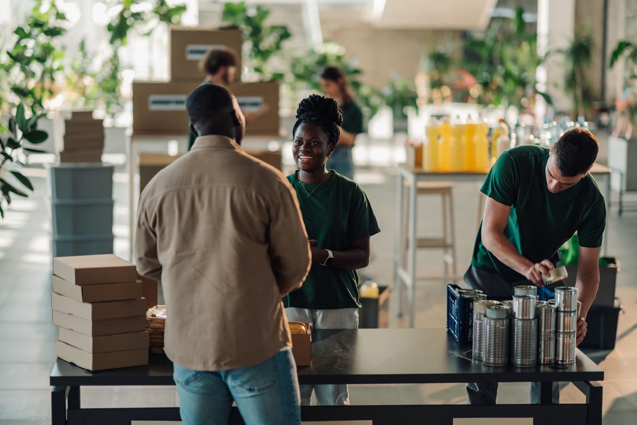 Volunteers organizing food donations at a community food bank