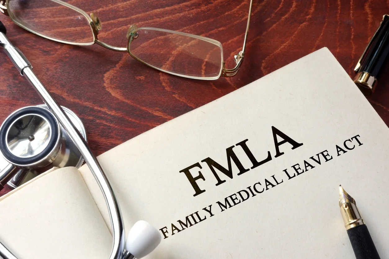 Professional business scene — Compliance Fmla Leave — benefits administration context