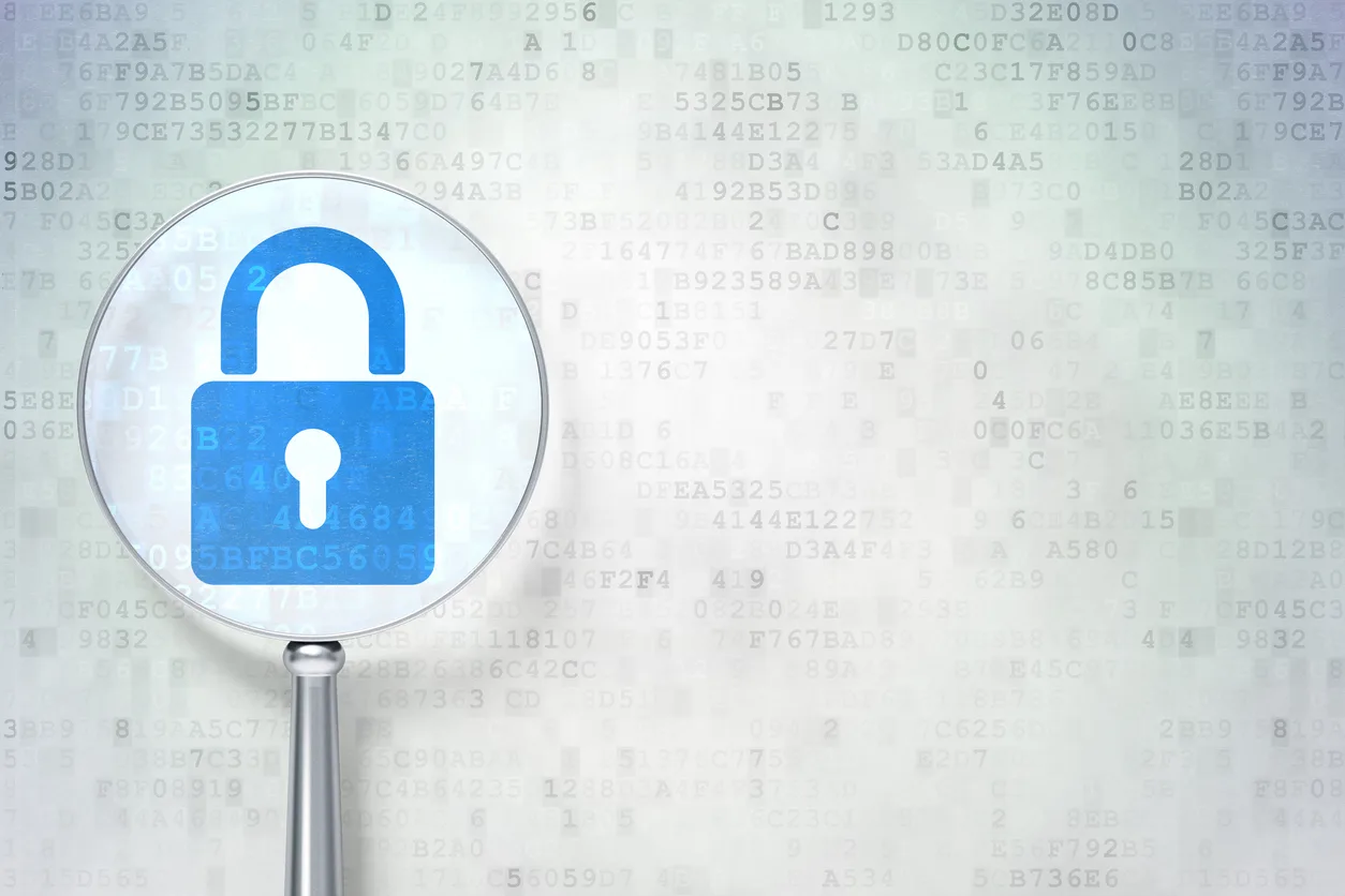 IT security professional reviewing risk assessment documentation and mitigation plans